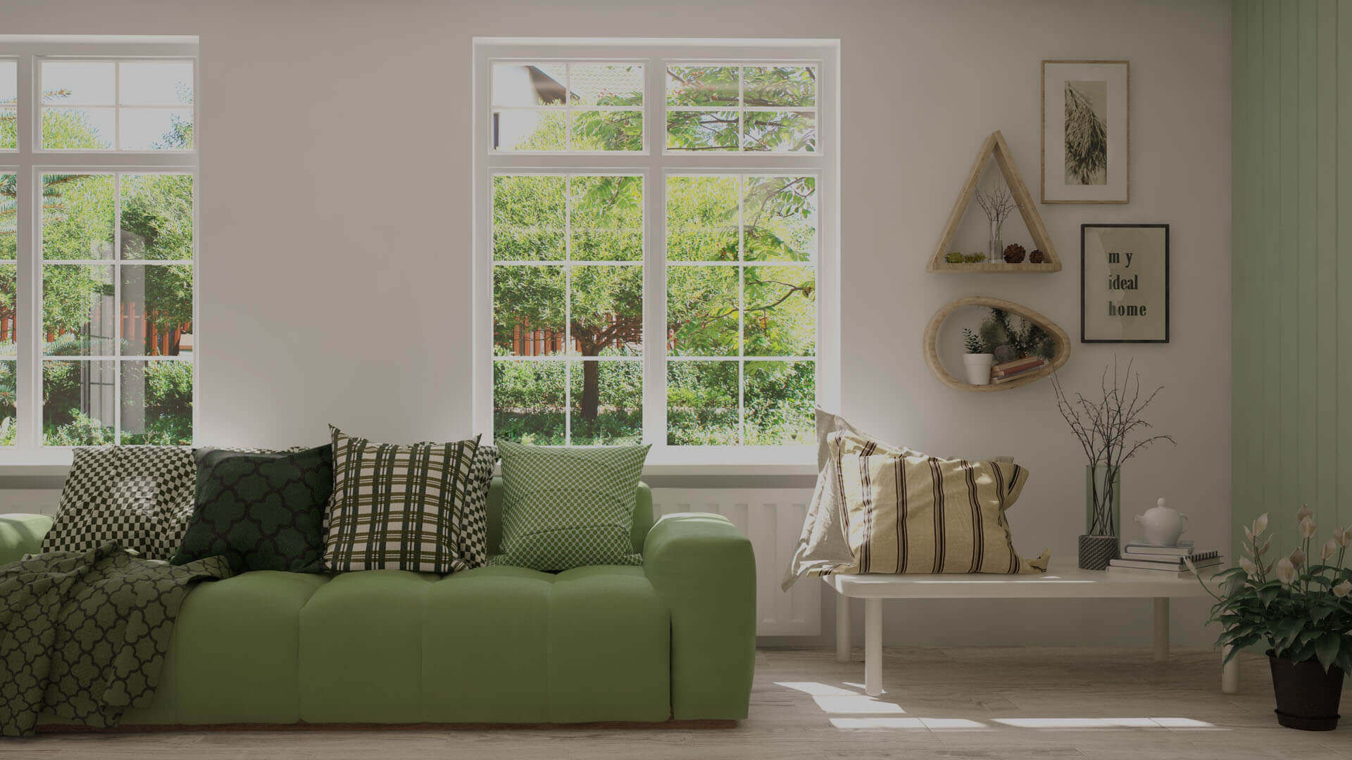 A bright living room with large windows and a comfortable sofa